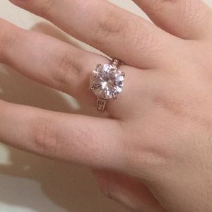 A beautiful diamond ring with diamonds around band